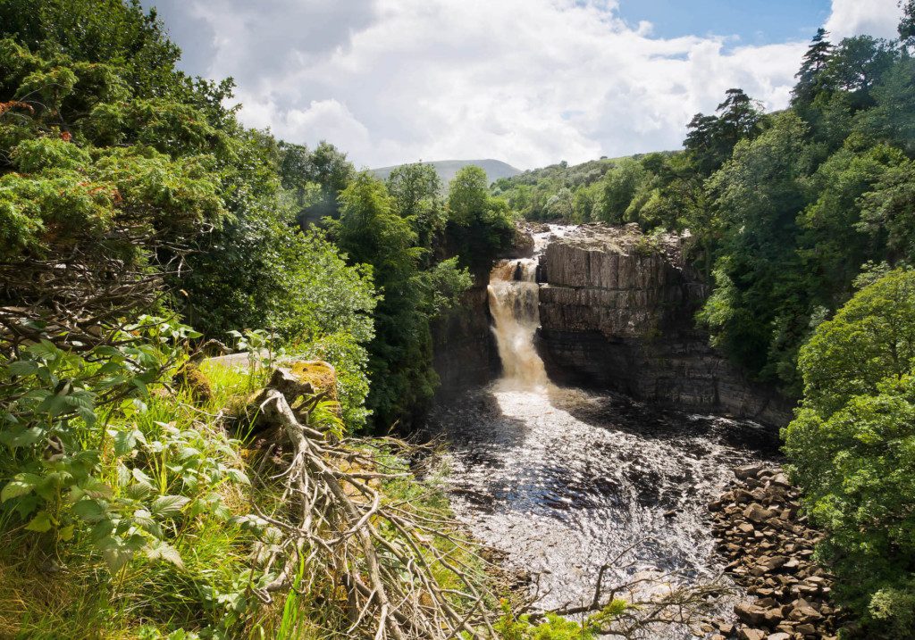 image of high force waterfall in the summer